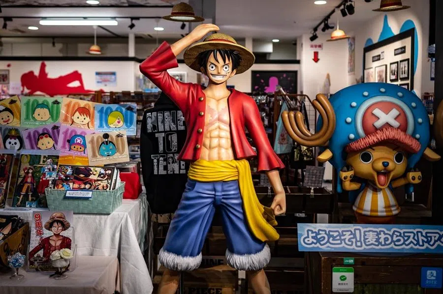 A statue of character Monkey D. Luffy, also known as Straw Hat, is displayed at the One Piece anime souvenir shop in Tokyo on 19 November 2021. (Philip Fong/AFP)