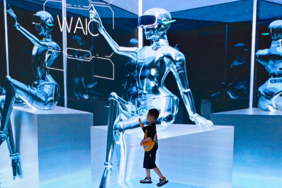 A child visits the World Artificial Intelligence Conference (WAIC) in Shanghai, China, on 6 July 2023. (Wang Zhao/AFP)