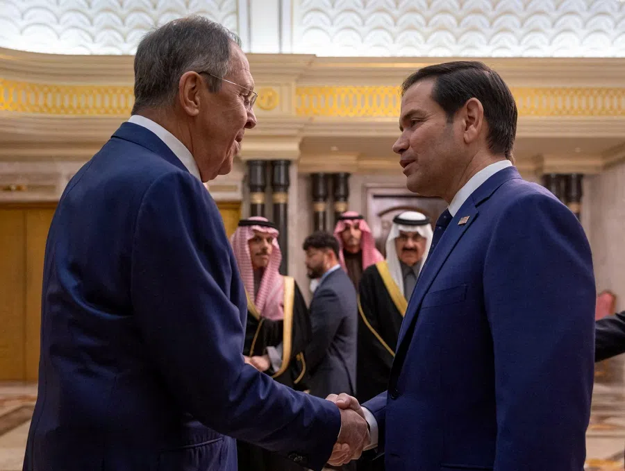 In this handout picture released by the official Saudi Press Agency (SPA), US Secretary of State Marco Rubio (right) shakes hands with Russian Foreign Minister Sergey Lavrov during their meeting at Diriyah Palace, in Riyadh, Saudi Arabia on 18 February 2025. (SPA/AFP)
