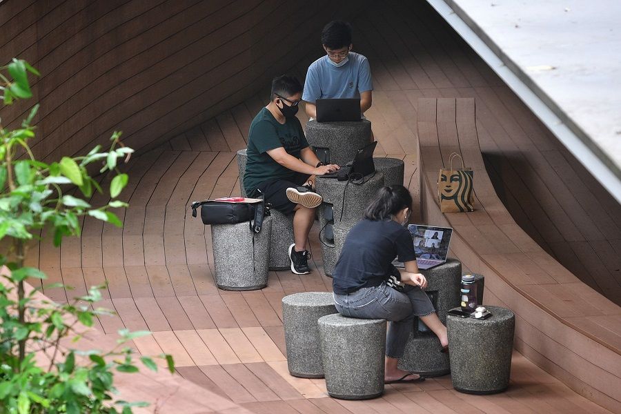 Students on their laptops at the National University of Singapore on 5 November 2021. (SPH Media)