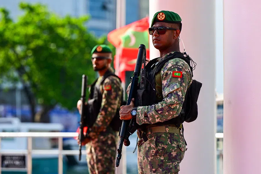 Maldives' Army soldiers stand guard ahead of the inauguration of Maldivian President-elect Mohamed Muizzu ahead of the inauguration ceremony in Male on 17 November 2023. (Ishara S. Kodikara/AFP)