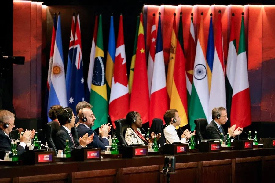 Delegates attend the handover ceremony during the G20 summit in Bali, Indonesia, on 16 November 2022. (Willy Kurniawan/Pool/AFP)