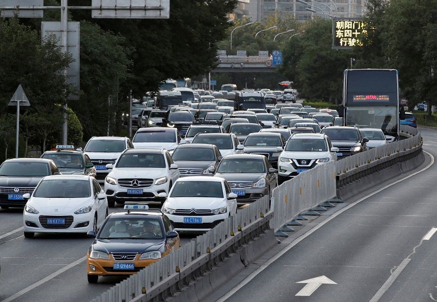Cars drive on the road during the evening rush hour in Beijing, China, on 1 July 2019. (Jason Lee/File Photo/Reuters)