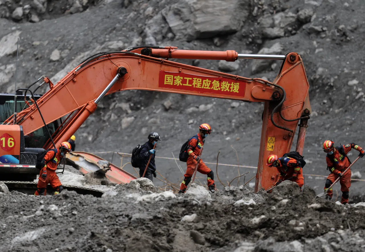 Rescue workers conduct search and rescue operations at the core disaster-hit area at Gyirong Port amid rescue efforts following the 26 August mudslide, during an organised media tour in Shigatse, Tibet Autonomous Region, China, 6 September 2026.