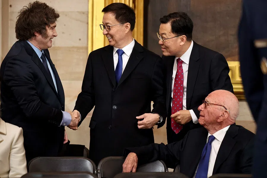 President of Argentina Javier Milei (left) greets Vice-President of China Han Zheng (second from left) as they attend the inauguration ceremony before Donald Trump is sworn in as the 47th US president in the US Capitol Rotunda in Washington, DC, US, on 20 January 2025. (Chip Somodevilla/Pool/AFP)