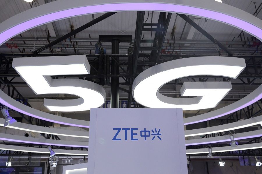 The ZTE logo and a sign for 5G are seen at the World 5G Exhibition in Beijing, China, 22 November 2019. (Jason Lee/File Photo/Reuters)