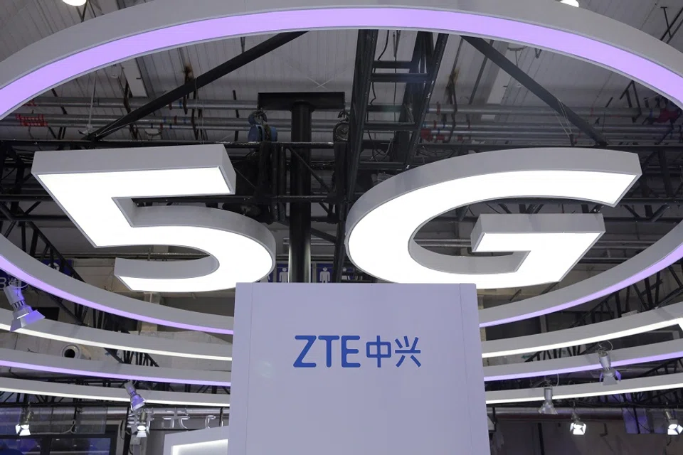 The ZTE logo and a sign for 5G are seen at the World 5G Exhibition in Beijing, China, 22 November 2019. (Jason Lee/File Photo/Reuters)