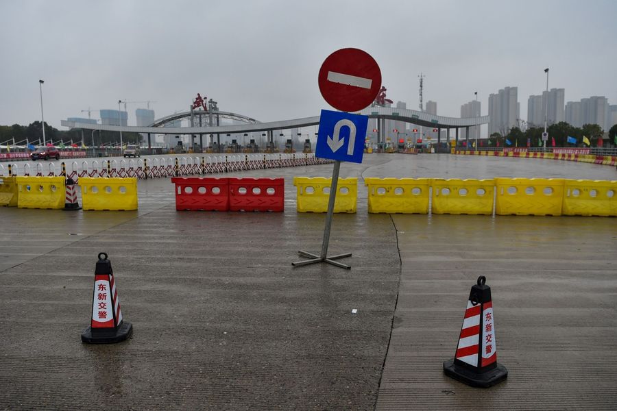 This photo taken on 25 January 2020 shows one of the roads that was blocked by the police to restrict people from leaving Wuhan. (Hector Retamal/AFP)