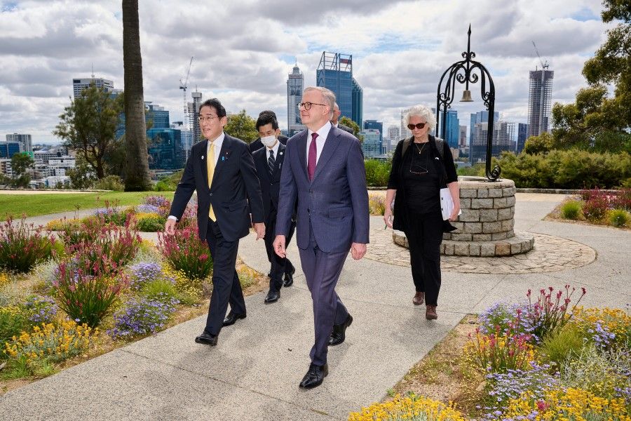 Prime Minister of Japan, Fumio Kishida and Australian Prime Minister Anthony Albanese walk together to their one-on-one meeting at Fraser's Restaurant on 22 October 2022 in Perth, Australia. (Stefan Gosatti/Pool via Reuters)