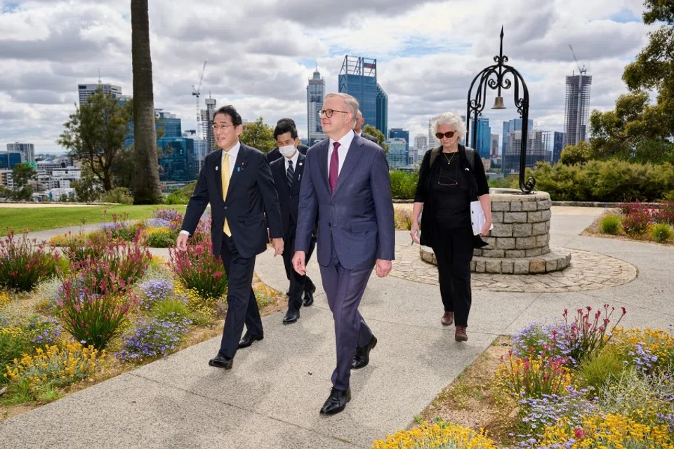 Prime Minister of Japan, Fumio Kishida and Australian Prime Minister Anthony Albanese walk together to their one-on-one meeting at Fraser's Restaurant on 22 October 2022 in Perth, Australia. (Stefan Gosatti/Pool via Reuters)