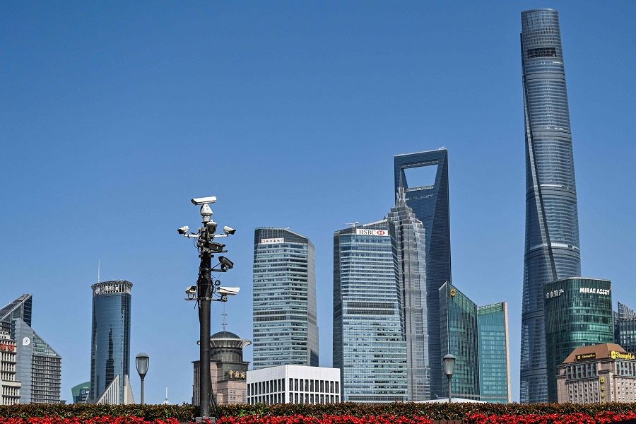 A tower of security cameras (centre, left) is seen on The Bund past the Lujiazui financial district in the background, in Shanghai, China, on 23 May 2023. (Hector Retamal/AFP)