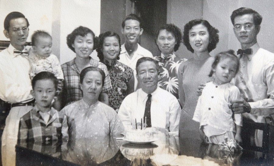 Ho Beng Hong (back row, first from left) at a family gathering. Seated in the front row (with tie) is Dr Ho Pao Jin, who was a banker and a principal of Chinese High School. (SPH)