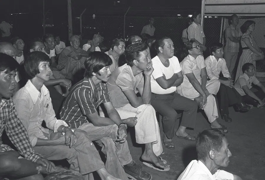 The crowd gathered before the TV set at the Hong Lim community centre to witness Prime Minister Lee Kuan Yew opening the Promote the Use of Mandarin campaign. (SPH Media)