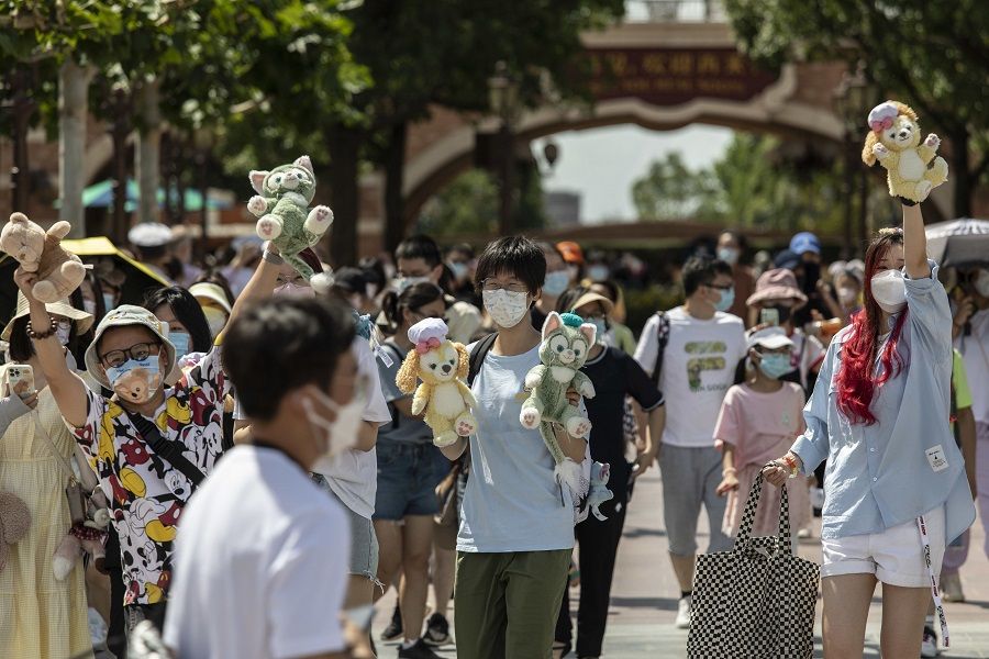 Visitors arrive at Shanghai Disneyland in Shanghai, China, on 30 June 2022. (Qilai Shen/Bloomberg)