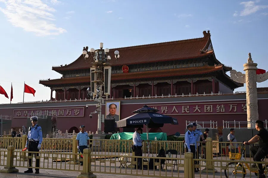 Police officers stand guard ahead of a military parade commemorating the 80th anniversary of the victory over Japan and the end of World War II, in Beijing’s Tiananmen Square on 1 September 2025. (Jade Gao/AFP)