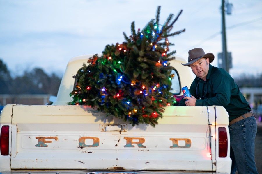 A tree on a pickup truck before the Lights of Lugoff Christmas Parade on 12 December 2020 in Lugoff, South Carolina. (Sean Rayford/AFP)