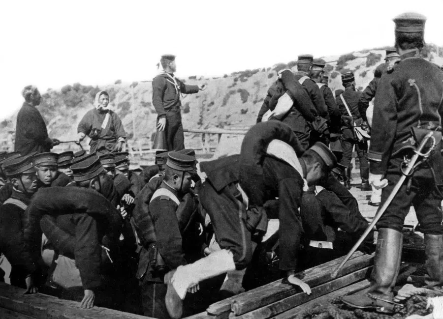 In March 1904, the Japanese First Army landed in Chinnampo (modern Nampo) in Korea. The picture shows a transport craft unloading Japanese troops on shore. After the Russian Army took northeastern China in 1900, Russia began to repair military fortresses in preparation for long-term occupation. Japan was worried that the completion of the Siberian Railway would hinder its own plans for northern expansion, and decided to quickly wage war against Russia. In February 1904, Japan formally broke off diplomatic relations with Russia, detaining Russian ships in Incheon and launching a sudden attack on the Russian Navy in Port Arthur, with both countries subsequently declaring war. Japan threw itself into the war, appointing Prince Ōyama Iwao and Viscount Kodama Gentarō as supreme commander and chief of general staff of the Manchurian Army, with Marquis Tōgō Heihachirō as commander-in-chief of the Combined Fleet. On land, 300,000 Japanese troops were divided into four. The First Army was led by Count Tamemoto Kuroki, landing at Chinnampo, southwest of Pyongyang, under cover of the Combined Fleet. The 19,000 Russian troops in east Manchuria around Jiuliancheng (northeast of what is now Dandong) attempted to stop the Japanese from advancing north. In May, the Japanese First Army launched an attack across the Yalu River on Jiuliancheng. The Russians retreated and the Japanese took Fenghuangcheng (now Fengcheng, Liaoning) and Kuandian, and rapidly advanced towards Mukden, the centre of the Russian Army in the Far East.