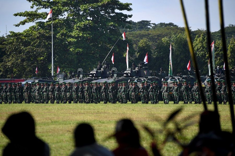 Indonesian soldiers from Military Command IX Udayana take part in a security drill in preparation for the G20 summit to be held in November, in Denpasar on Indonesia's resort island of Bali on 16 June 2022. (Sonny Tumbelaka/AFP)