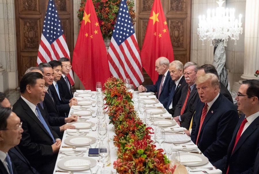 US President Donald Trump (second from right) and the US delegation hold a dinner meeting with China's President Xi Jinping (third from left) and Chinese government representatives, at the end of the G20 Leaders' Summit in Buenos Aires on 1 December 2018. (Saul Loeb/AFP)