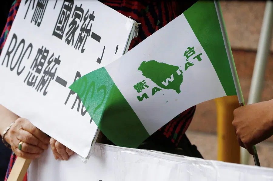 Protesters calling for Taiwan independence hold banners in front of Democratic Progressive Party in Taipei, Taiwan, on 20 May 2020. (Ann Wang/Reuters)
