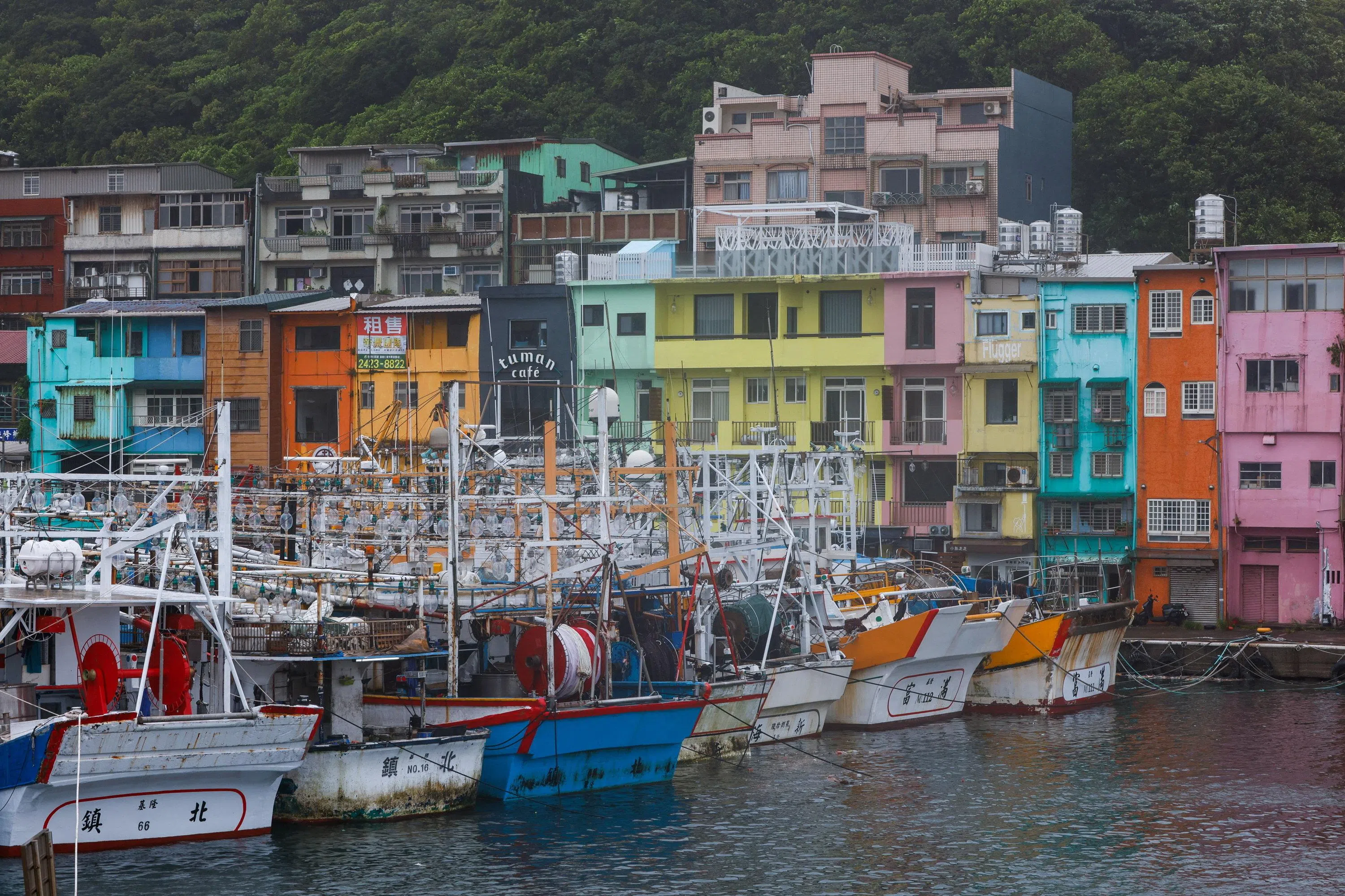 Fishing boats are moored at Zhengbin Fishing Harbor in Keelung, Taiwan on 11 July 2026.