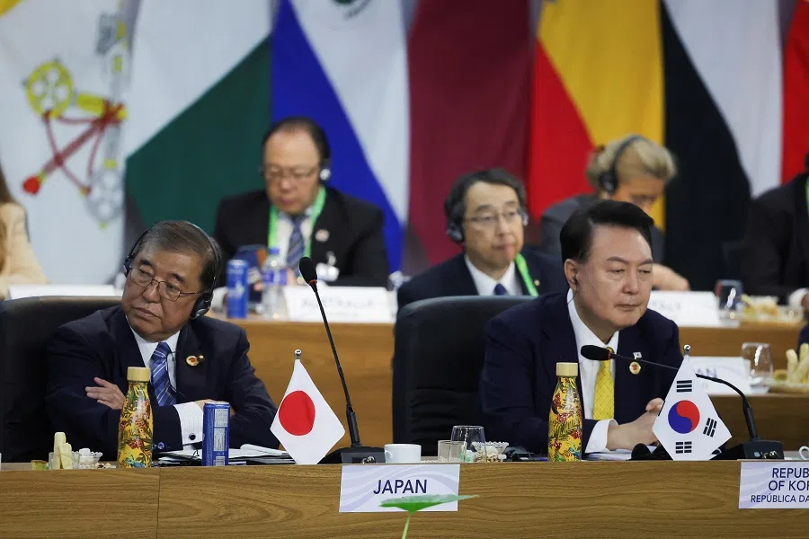 Japan’s Prime Minister Shigeru Ishiba and South Korea’s President  Yoon Suk-yeol attend the G20 summit at the Museum of Modern Art in Rio de Janeiro, Brazil, on 18 November 2024. (Ricardo Moraes/Reuters)