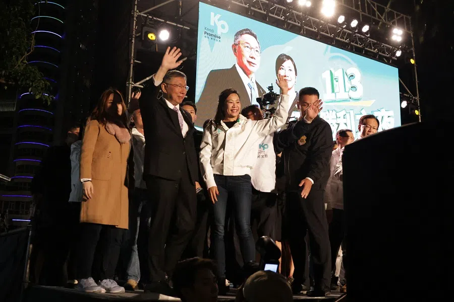 Taiwan People's Party (TPP) presidential candidate Ko Wen-je (left) and his running mate Cynthia Wu wave to supporters at the TPP headquarters in Xinzhuang in New Taipei City, Taiwan, on 13 January 2024, after voting closed in the presidential election. (I-Hwa Cheng/AFP)