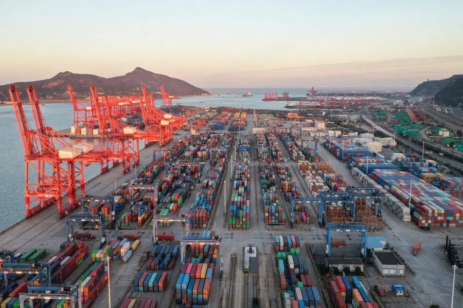 This aerial photo taken on 11 October 2021 shows containers stacked at Lianyungang port, in China's eastern Jiangsu province. (STR/AFP)