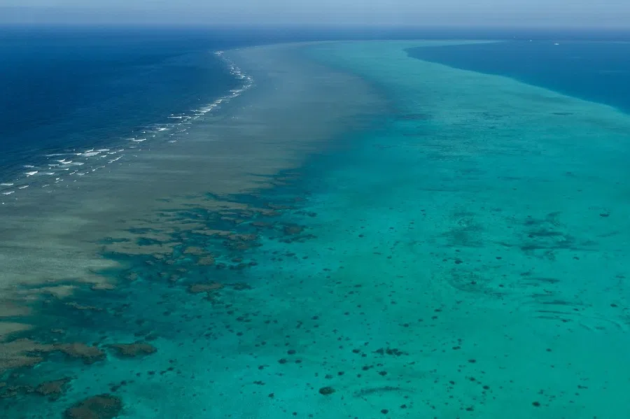 This photo taken on 15 February 2024 shows an aerial view over the Scarborough Shoal in the disputed South China Sea.