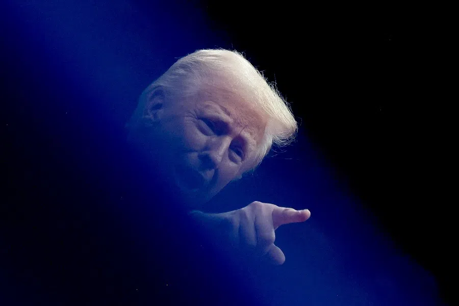 US President Donald Trump gestures at the inaugural parade inside Capital One Arena on the inauguration day of his second presidential term, in Washington, US, on 20 January 2025.