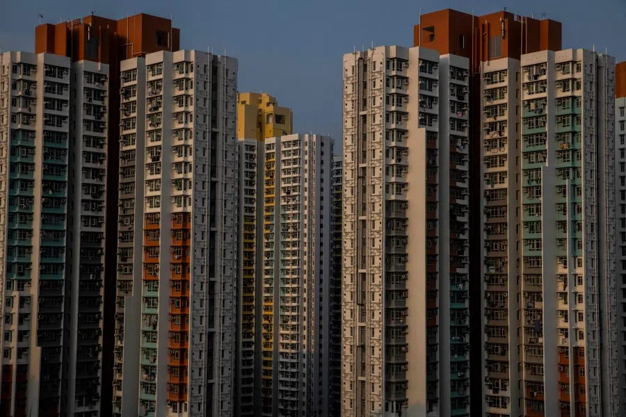 Residential buildings are seen in Sham Shui Po in Hong Kong on 23 August 2022. (Isaac Lawrence/AFP)