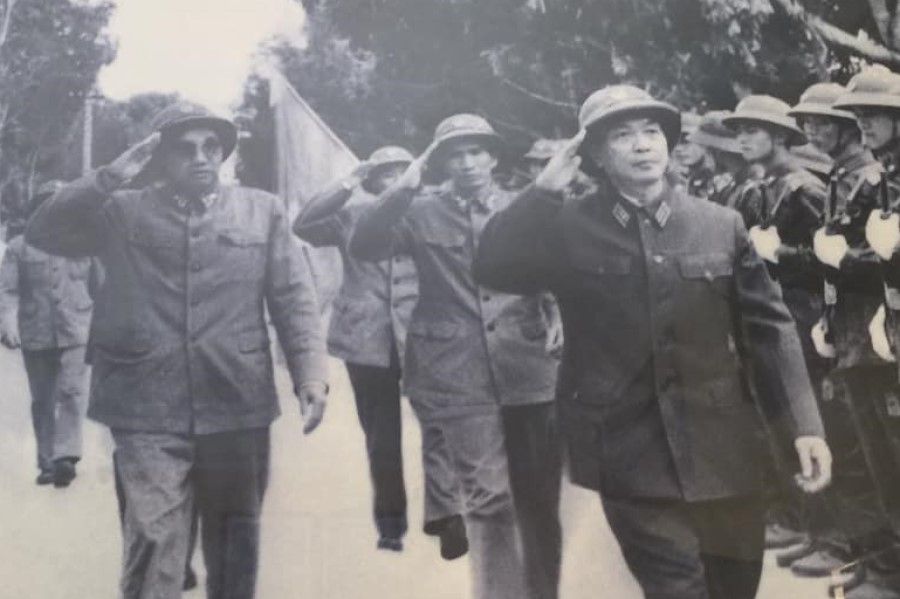 General Vo Nguyen Giap (right) at a military parade, undated. (Wikimedia)