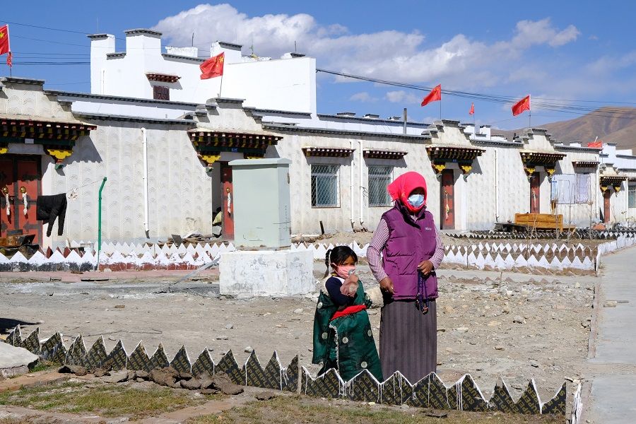 Chinese flags are placed above every house at the government-built residential area in Tibet.