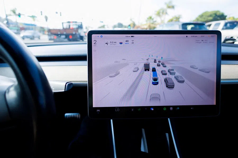  A Tesla Model 3 vehicle drives using FSD (Full Self-Driving) in Encinitas, California, US, on 18 October 2023. (Mike Blake/Reuters)