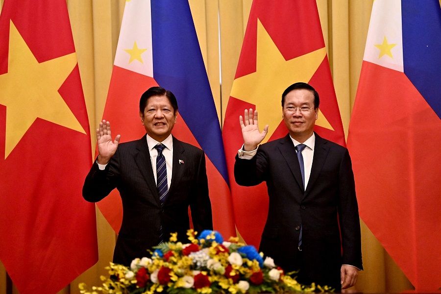 The Philippine's Ferdinand Romualdez Marcos Jr (left) and Vietnam's President Vo Van Thuong (right) attend a welcoming ceremony at the Presidential Palace in Hanoi on 30 January 2024. (Nhac Nguyen/AFP)