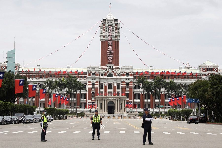 Police officers stand guard in front of the Presidential Office Building during the inauguration ceremony of Taiwan President Tsai Ing-wen in Taipei, Taiwan, on 20 May 2020. (Ann Wang/Reuters)
