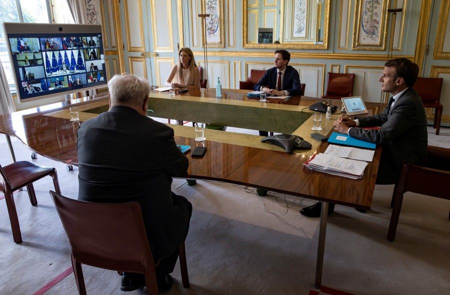 French President Emmanuel Macron attends a video conference with members of the European Council, at the Elysee Palace in Paris, April 23, 2020. (Ian Langsdon/REUTERS)