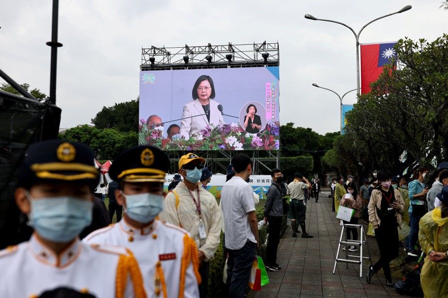 A big screen shows Taiwan's President Tsai Ing-wen giving a speech on National Day in Taipei, Taiwan, 10 October 2022. (Ann Wang/Reuters)