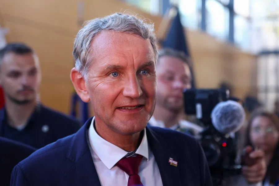 Bjorn Hocke, member of Alternative fur Deutschland (AfD), speaks to media members after first exit polls in the Thuringia state elections, in the state parliament building in Erfurt, Germany, on 1 September 2024. (Thilo Schmuelgen/Reuters)