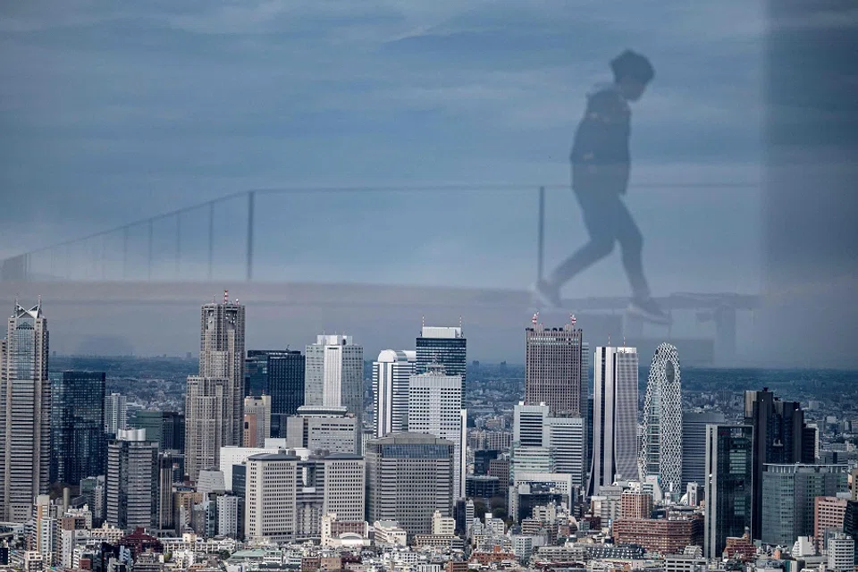 A general view shows the skyline of Tokyo's Shinjuku area on 22 March 2021. (Charly Triballeau/AFP)