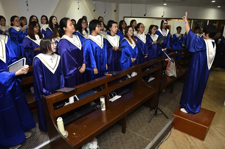 Me (front row, first from left) singing with the choir at Easter mass, 2026.