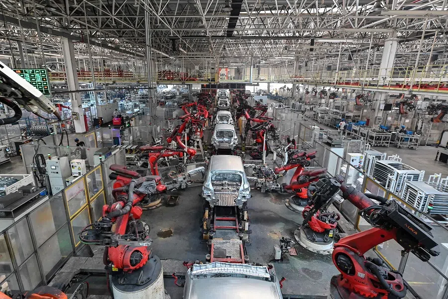 A general view shows an electric vehicle production line at the Leapmotor factory in Jinhua, Zhejiang province, China, on 18 September 2024. (Adek Berry/AFP)