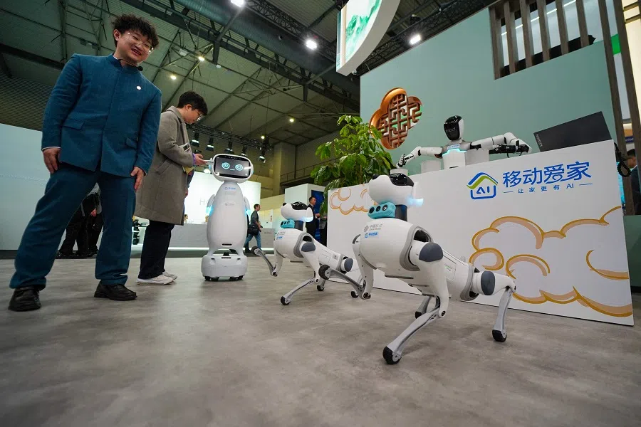 A four legged robot dog named XiaoLi is displayed at the China Mobile stand during the MWC (Mobile World Congress), in Barcelona, Spain, on 3 March 2025. (Manaure Quintero/AFP)