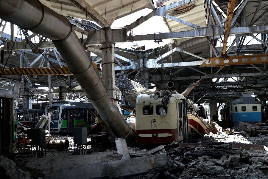 Damaged trams are seen inside a shelled tram depot, amid Russia's attack on Ukraine, in Kharkiv, Ukraine, 15 June 2022. (Ivan Alvarado/Reuters)