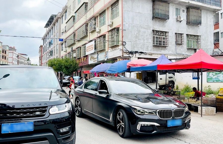 Luxury cars throng the streets in Changkeng township, Anxi county.