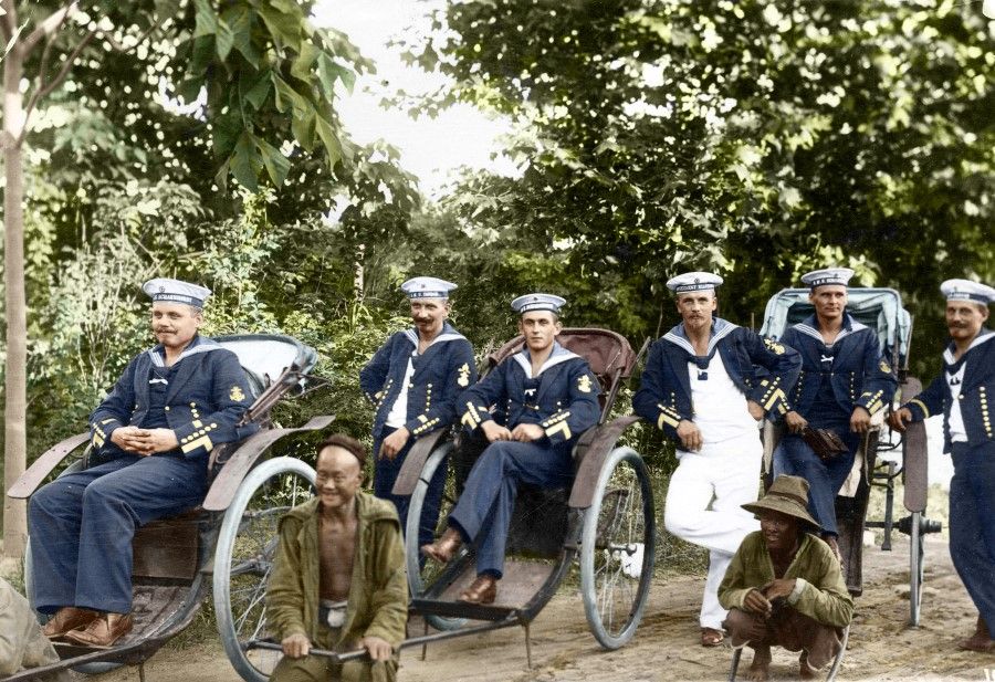 German naval officers riding Chinese rickshaws near Qingdao, in the mid-1900s.
