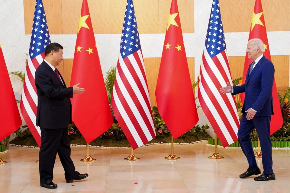 US President Joe Biden meets with Chinese President Xi Jinping on the sidelines of the G20 leaders' summit in Bali, Indonesia, on 14 November 2022. (Kevin Lamarque/Reuters)