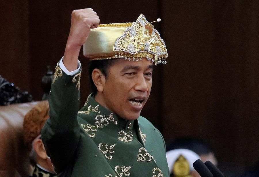 Indonesian President Joko Widodo shouts 'Merdeka' or 'Freedom' while delivering his State of the Nation Address ahead of the country's Independence Day at the parliament building in Jakarta, Indonesia, 16 August 2022. (Bagus Indahono/Pool via Reuters/File Photo)