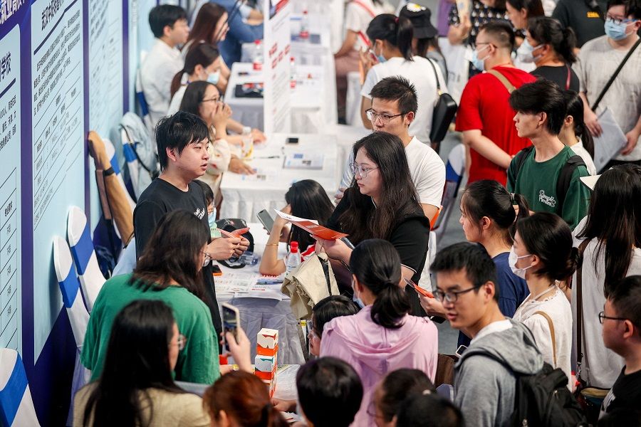 University graduates attend a job fair in Wuhan, in China's central Hubei province, on 10 August 2023. (AFP)