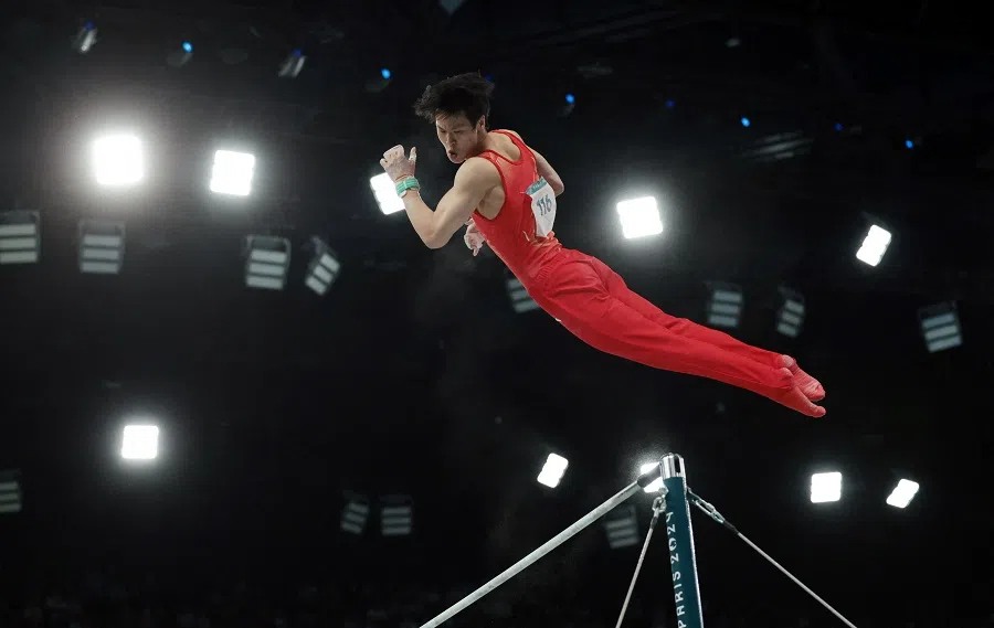Su Weide of China in action on the horizontal bar, artistic gymnastics, men’s team final, Bercy Arena, Paris, France, on 29 July 2024. (Paul Childs/Reuters)